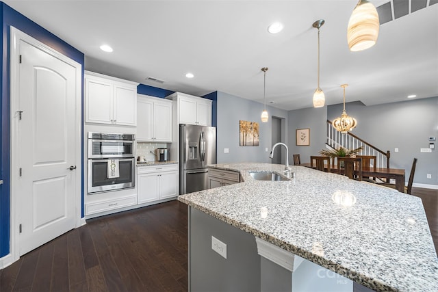 1284 Independence St, Fort Mill, SC 29708 - kitchen featuring a sink, stainless steel appliances, dark wood-type flooring, light stone counters, and recessed lighting