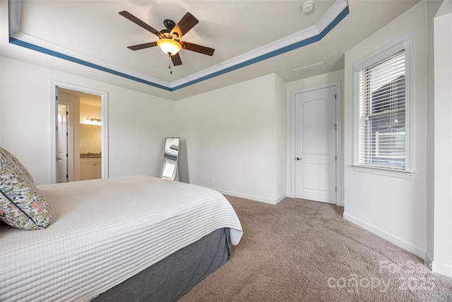 1284 Independence St, Fort Mill, SC 29708 - carpeted bedroom with a tray ceiling, baseboards, a ceiling fan, and ensuite bathroom