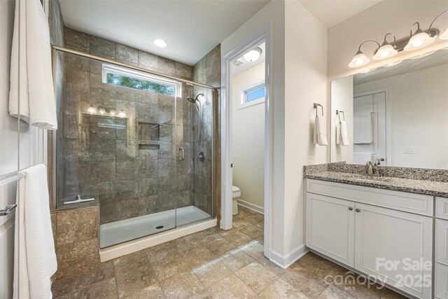 1284 Independence St, Fort Mill, SC 29708 - full bathroom featuring plenty of natural light, a shower stall, toilet, and vanity