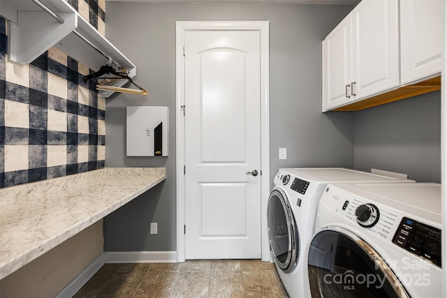 1284 Independence St, Fort Mill, SC 29708 - laundry area with washer and dryer, cabinet space, and baseboards