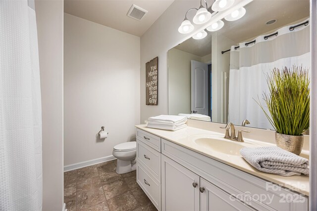 1284 Independence St, Fort Mill, SC 29708 - full bathroom featuring toilet, vanity, baseboards, curtained shower, and stone finish floors