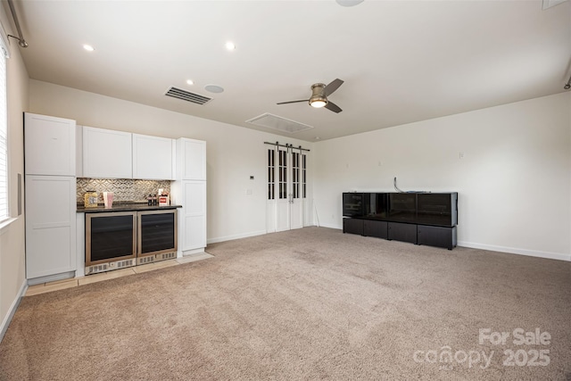 1284 Independence St, Fort Mill, SC 29708 - unfurnished living room with ceiling fan, carpet, a dry bar, baseboards, and recessed lighting