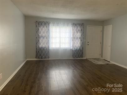 120 Booker St, Wingate, NC 28112 - unfurnished room featuring wood finished floors and baseboards