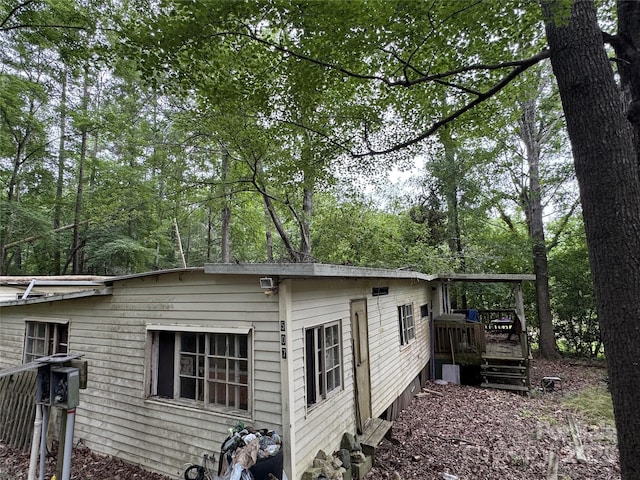 509 Waring Ct Lot 4, Fort Mill, SC 29707 - view of property exterior featuring a wooden deck and view of wooded area