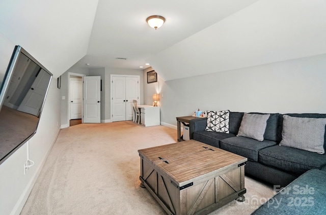 7006 Nesbit Rd, Waxhaw, NC 28173 - living room with baseboards, light colored carpet, vaulted ceiling, and recessed lighting