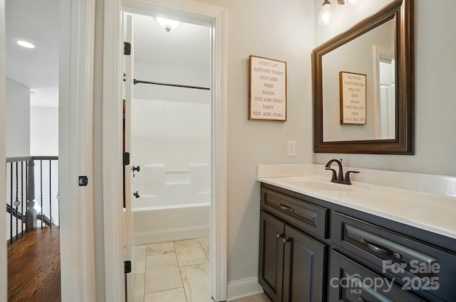 7006 Nesbit Rd, Waxhaw, NC 28173 - bathroom with vanity, baseboards, marble finish flooring, and shower / bath combination