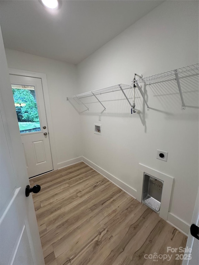 807 S Bostian St, China Grove, NC 28023 - laundry room with hookup for a washing machine, light wood-style floors, and electric dryer hookup
