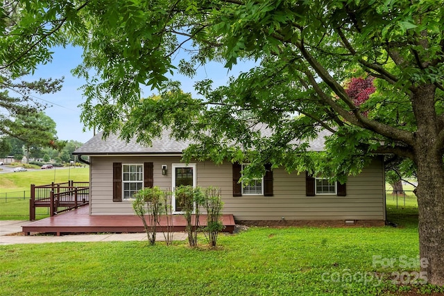 103A N Tracy St, Kings Mountain, NC 28086 - rear view of house featuring a deck, a shingled roof, and crawl space