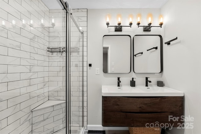 103A N Tracy St, Kings Mountain, NC 28086 - bathroom featuring a stall shower, double vanity, and baseboards
