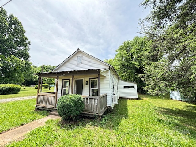 502 E Main St, Cleveland, NC 27013 - view of front of property with a porch and a front yard