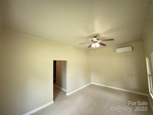502 E Main St, Cleveland, NC 27013 - empty room with a wall mounted air conditioner, ceiling fan, wood finished floors, and baseboards