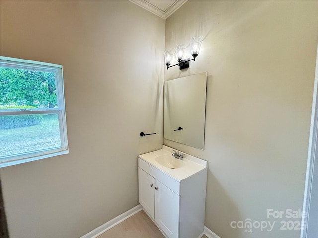 502 E Main St, Cleveland, NC 27013 - bathroom with vanity, ornamental molding, and baseboards