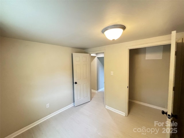 502 E Main St, Cleveland, NC 27013 - unfurnished bedroom with light wood finished floors and baseboards