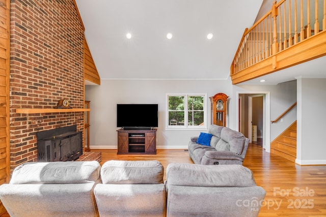 6350 Mount Pleasant Rd S, Concord, NC 28025 - living room featuring high vaulted ceiling, baseboards, stairway, wood finished floors, and recessed lighting