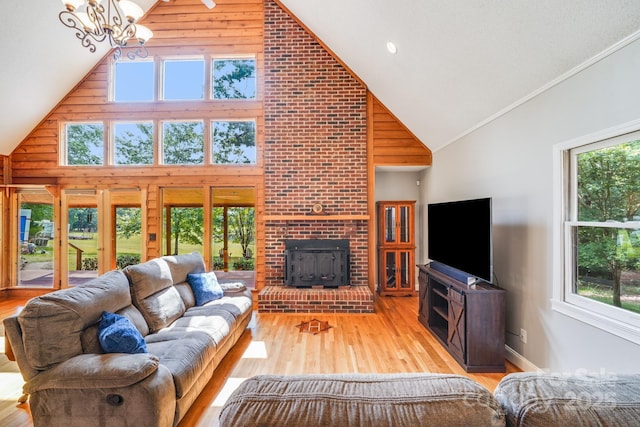 6350 Mount Pleasant Rd S, Concord, NC 28025 - living area featuring high vaulted ceiling, wood finished floors, and a fireplace