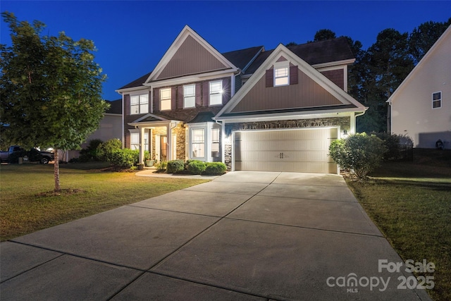 4500 Carrington Dr, Lancaster, SC 29720 - view of front facade with stone siding, a yard, driveway, and a garage