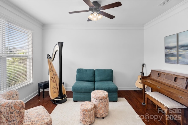 4500 Carrington Dr, Lancaster, SC 29720 - sitting room featuring healthy amount of natural light, wood finished floors, crown molding, a ceiling fan, and baseboards