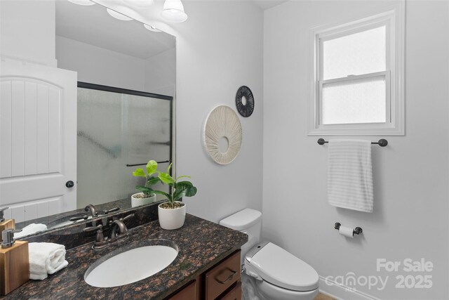4500 Carrington Dr, Lancaster, SC 29720 - bathroom featuring a stall shower, toilet, and vanity
