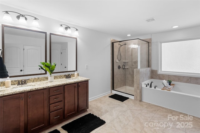 4500 Carrington Dr, Lancaster, SC 29720 - full bathroom with double vanity, a shower stall, a bath, tile patterned floors, and recessed lighting