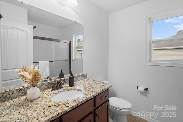 4500 Carrington Dr, Lancaster, SC 29720 - full bath featuring toilet, vanity, a shower with door, tile patterned flooring, and baseboards