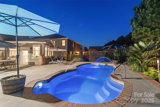 4500 Carrington Dr, Lancaster, SC 29720 - pool at twilight featuring a patio area and a jacuzzi