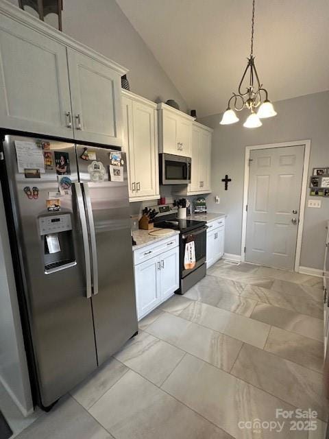 111 Brookview Dr, Shelby, NC 28152 - kitchen featuring appliances with stainless steel finishes, a chandelier, white cabinets, pendant lighting, and high vaulted ceiling