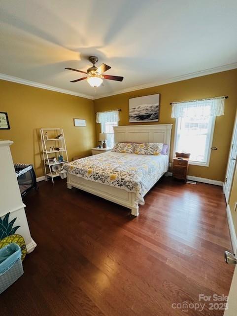111 Brookview Dr, Shelby, NC 28152 - bedroom featuring dark wood-type flooring, crown molding, baseboards, and ceiling fan