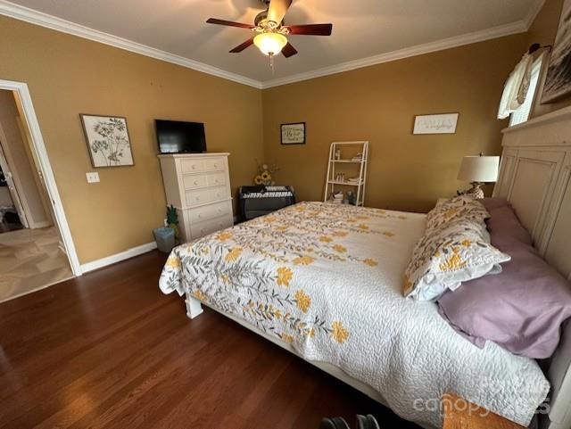 111 Brookview Dr, Shelby, NC 28152 - bedroom with wood finished floors, baseboards, ornamental molding, and a ceiling fan