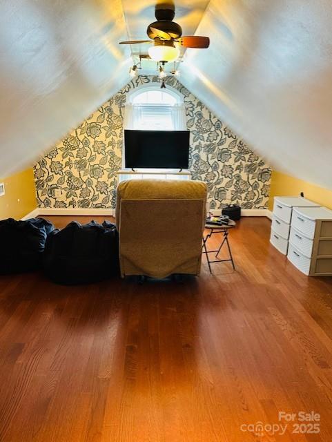 111 Brookview Dr, Shelby, NC 28152 - living area featuring a ceiling fan, wood finished floors, lofted ceiling, and wallpapered walls