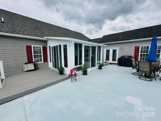 111 Brookview Dr, Shelby, NC 28152 - rear view of property with a wooden deck, a sunroom, french doors, and a patio