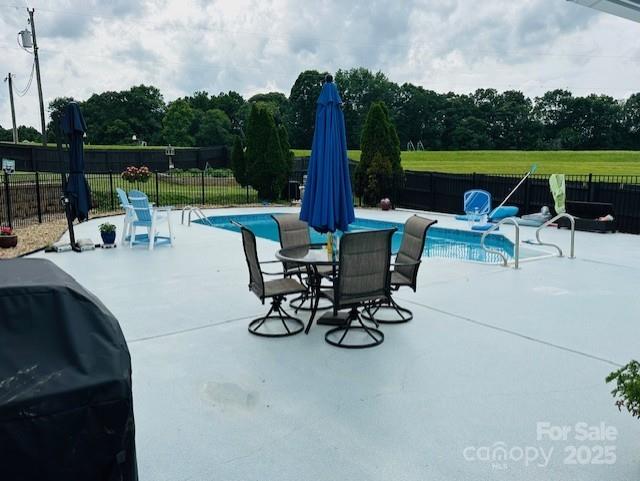 111 Brookview Dr, Shelby, NC 28152 - view of swimming pool featuring a patio area and a grill