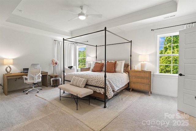 433 Sinaloa St, Waxhaw, NC 28173 - carpeted bedroom with an office area, baseboards, a tray ceiling, a ceiling fan, and crown molding