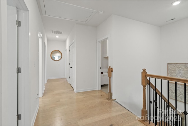 433 Sinaloa St, Waxhaw, NC 28173 - hallway with an upstairs landing, attic access, light wood-style flooring, recessed lighting, and baseboards