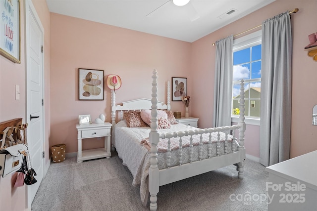 433 Sinaloa St, Waxhaw, NC 28173 - carpeted bedroom with baseboards and a ceiling fan