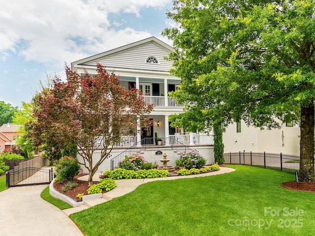 1600 Princeton Ave, Charlotte, NC 28209 - neoclassical home with a gate, a porch, a balcony, and stairs