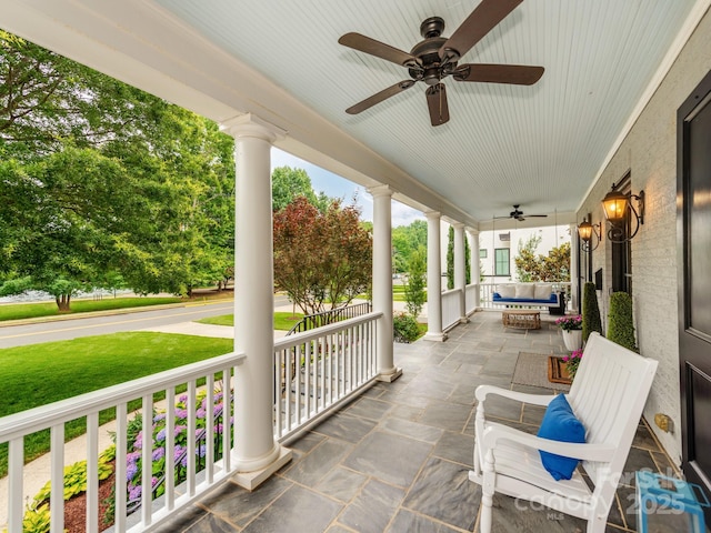 1600 Princeton Ave, Charlotte, NC 28209 - covered porch featuring a ceiling fan