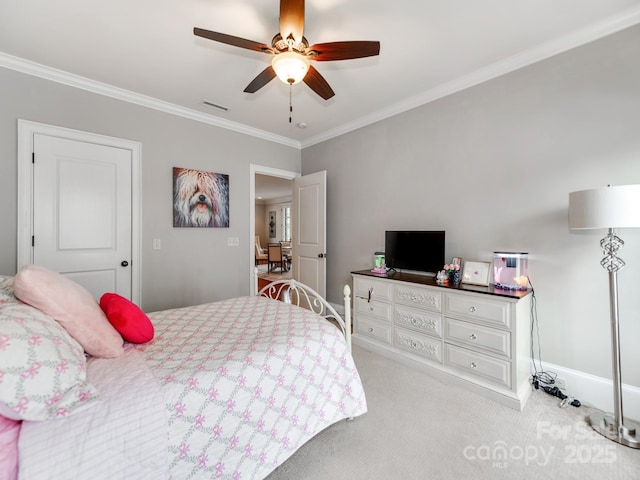 1600 Princeton Ave, Charlotte, NC 28209 - carpeted bedroom with crown molding, baseboards, and a ceiling fan