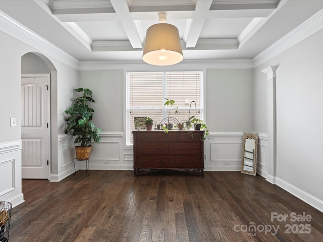 1810 Kerwick Ct, Lancaster, SC 29720 - dining area featuring coffered ceiling, dark wood-style floors, arched walkways, beam ceiling, and a wainscoted wall