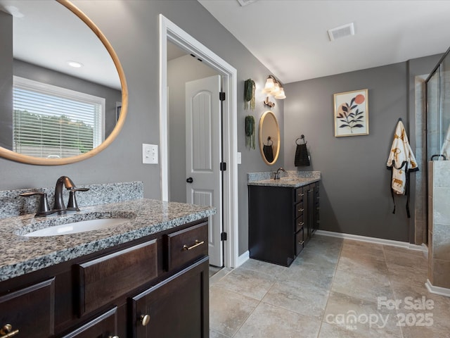 1810 Kerwick Ct, Lancaster, SC 29720 - bathroom with two vanities, a shower stall, and baseboards