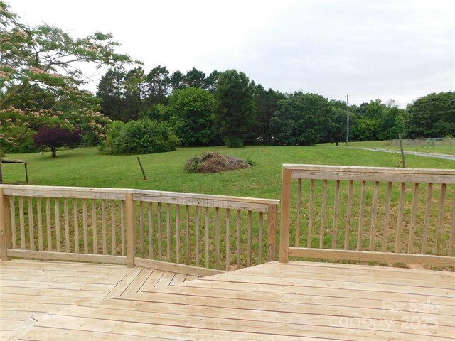 3001 Austin Chaney Rd, Monroe, NC 28110 - wooden deck featuring a lawn
