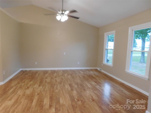 3001 Austin Chaney Rd, Monroe, NC 28110 - empty room featuring vaulted ceiling, light wood finished floors, a ceiling fan, and baseboards