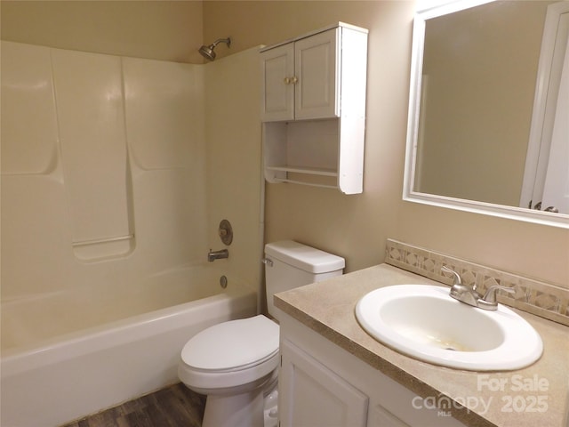 3001 Austin Chaney Rd, Monroe, NC 28110 - full bath with vanity, toilet, shower / tub combination, and wood finished floors