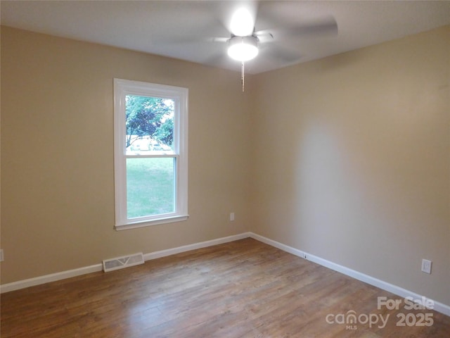 3001 Austin Chaney Rd, Monroe, NC 28110 - unfurnished room with a ceiling fan, wood finished floors, and baseboards