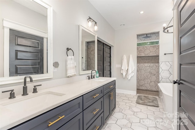 5215 Star Magnolia Ct, Clover, SC 29710 - bathroom featuring a tile shower, double vanity, a freestanding tub, tile patterned floors, and recessed lighting