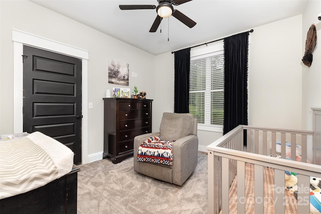 5215 Star Magnolia Ct, Clover, SC 29710 - carpeted bedroom featuring baseboards, a crib, and ceiling fan