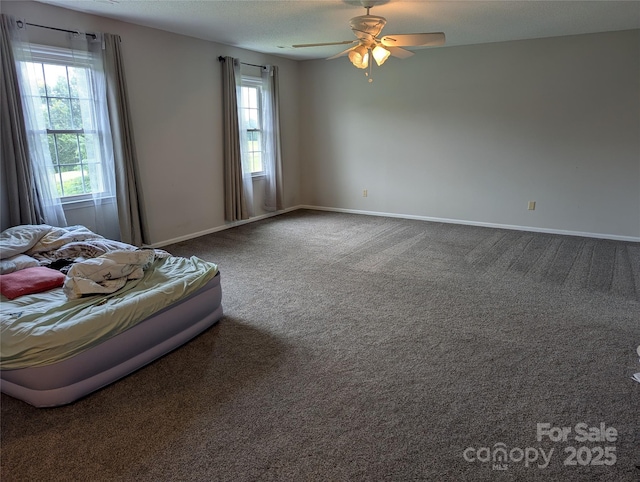 936 New Camp Creek Church Rd Unit 11, Kings Mountain, NC 28086 - carpeted bedroom with multiple windows and baseboards