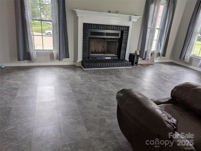 936 New Camp Creek Church Rd Unit 11, Kings Mountain, NC 28086 - living area with baseboards and a brick fireplace