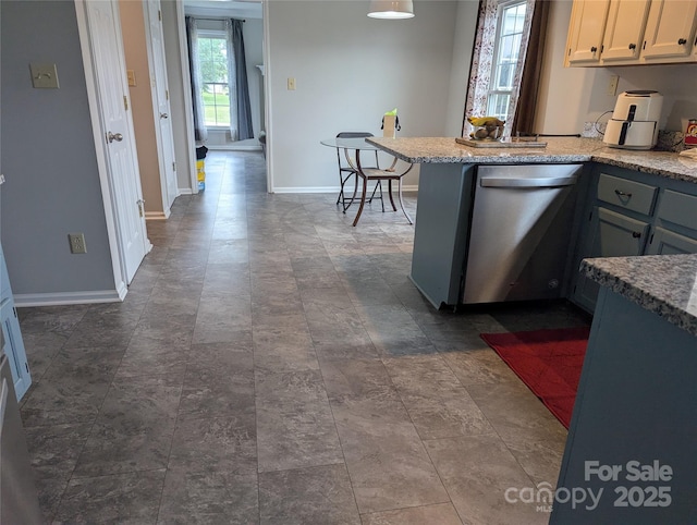 936 New Camp Creek Church Rd, Kings Mountain, NC 28086 - kitchen with dishwasher, a peninsula, and light stone countertops