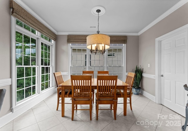 7412 Sahalee Dr, Denver, NC 28037 - dining room with a chandelier, baseboards, ornamental molding, and light tile patterned floors