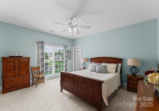 7412 Sahalee Dr, Denver, NC 28037 - bedroom with light carpet, a ceiling fan, and baseboards